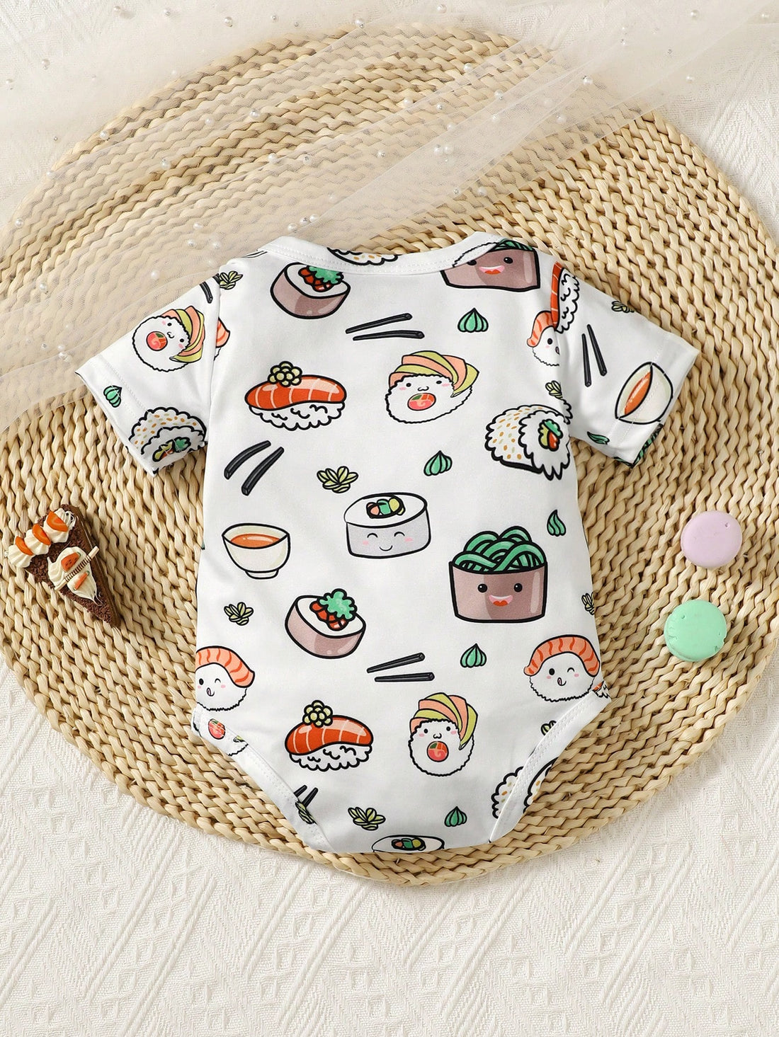 Get ready for a daring and delicious adventure with our Baby Boy Sushi Print Bodysuit! Made with short sleeves and a bold sushi print, your little one will stand out in style. Perfect for showing off your love for sushi and taking on the unknown - order now!