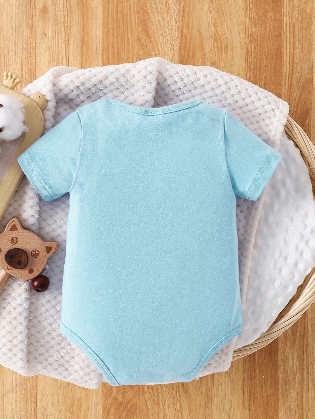 This Adorable Summer Baby Boy Slogan Bodysuit is a must-have for stylish little ones. Made with soft and breathable materials, it is perfect for the warm weather. Featuring a cute slogan, it adds a playful touch to any outfit. Give your baby a stylish look while keeping them comfortable.