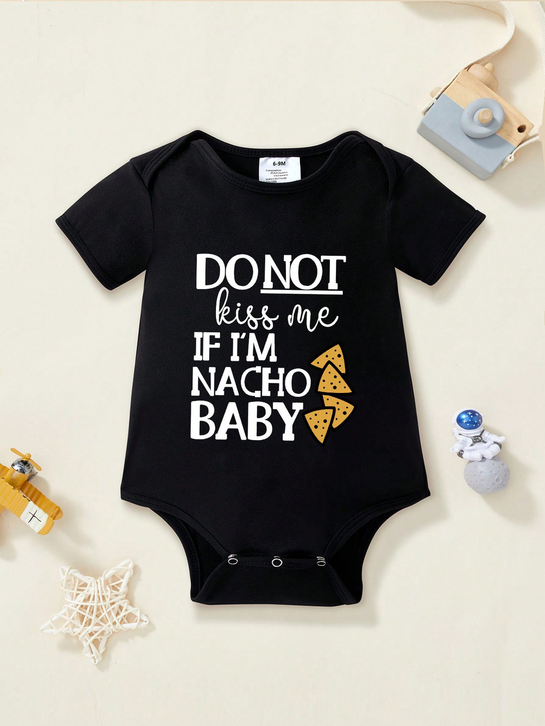 This Baby Girl Slogan Printed Short Sleeve Bodysuit is a must-have for your little one. The soft fabric and short sleeves provide all-day comfort, while the adorable slogan adds a fun touch. Perfect for playtime or everyday wear, this bodysuit is a practical and stylish addition to your baby's wardrobe.