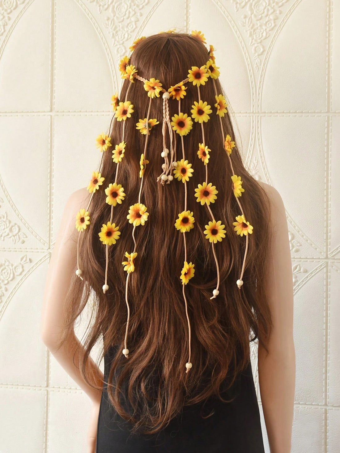 Introduce a touch of bohemian charm to any outfit with our Bohemian Bloom headband. Featuring a gorgeous sunflower and daisy floral design, this headband is perfect for girls and teens. Made with high-quality materials, it's both stylish and comfortable to wear. Add a pop of nature-inspired beauty to your look today.