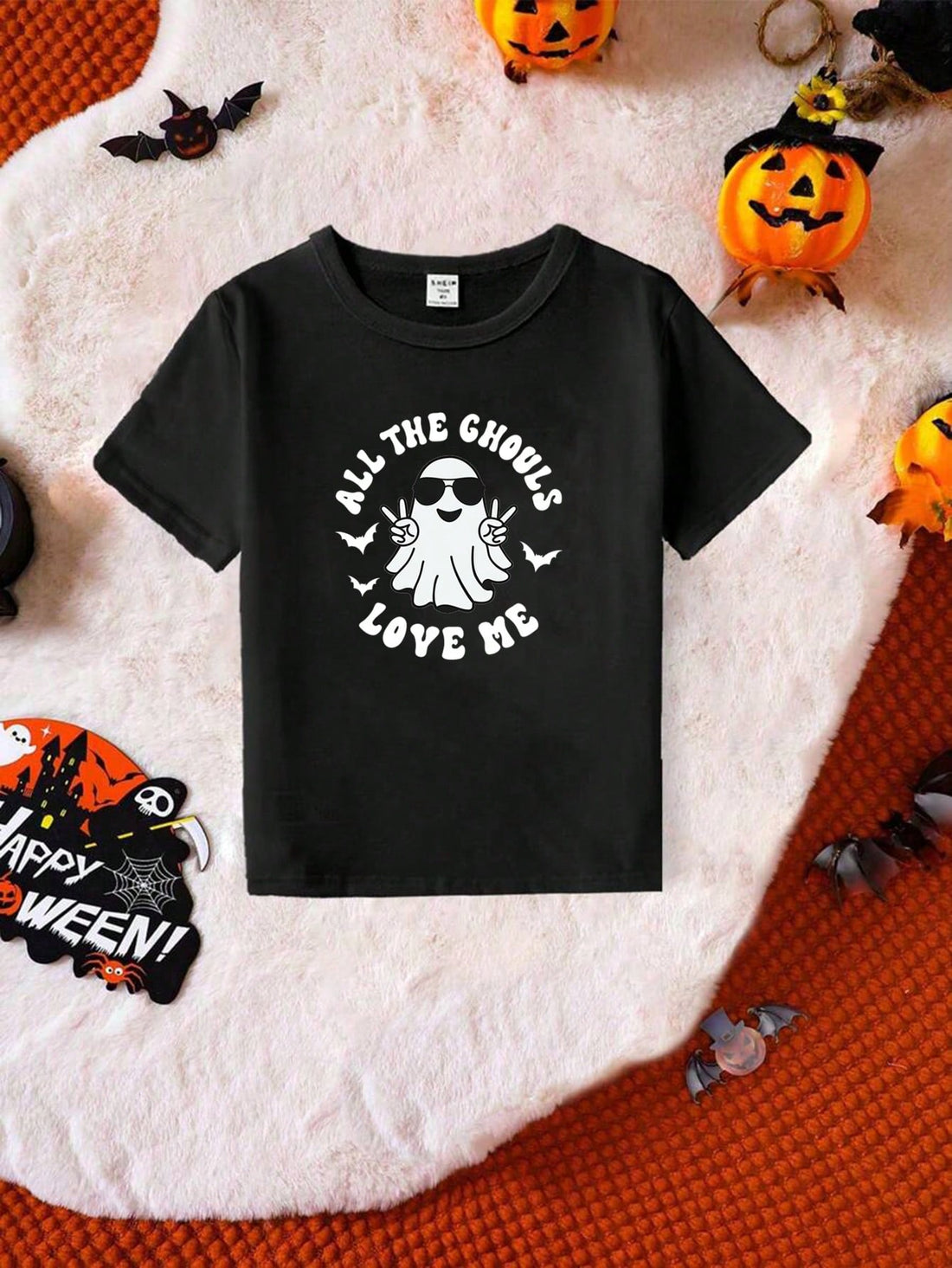 Spooky never looked so stylish with our Young Boys' Ghost Print Crew Neck Short Sleeve T-Shirt. Featuring a fun and fashionable ghost print, this shirt is perfect for kids who love all things spooky. Made with a comfortable crew neck and short sleeves, it's the perfect addition to any young boy's wardrobe.