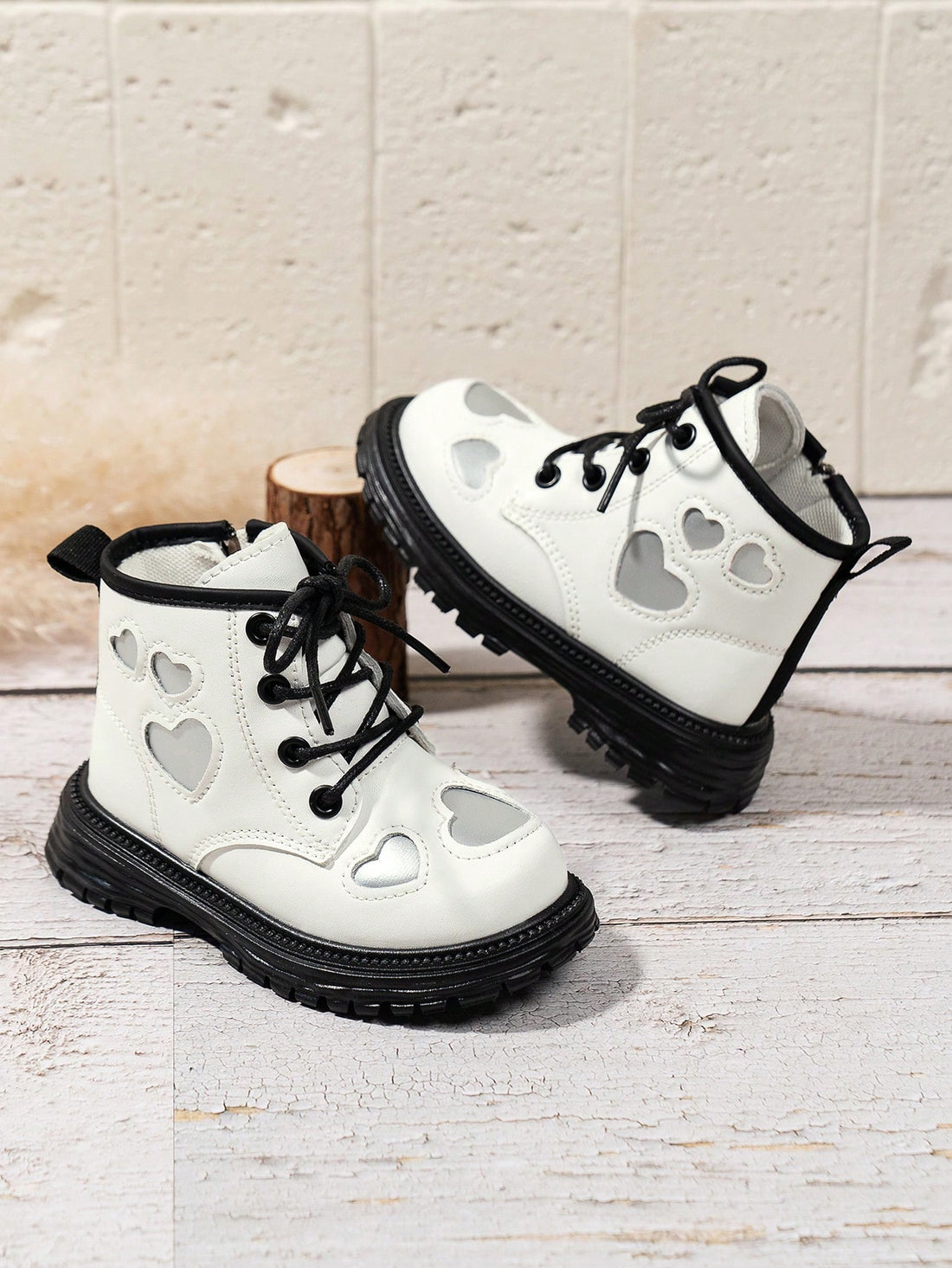 These Chic and Cozy toddler boots offer both style and safety with their British-inspired design and anti-skid leather material. Keep your little girl warm and stylish while preventing slips and falls. A must-have for any fashionable toddler.