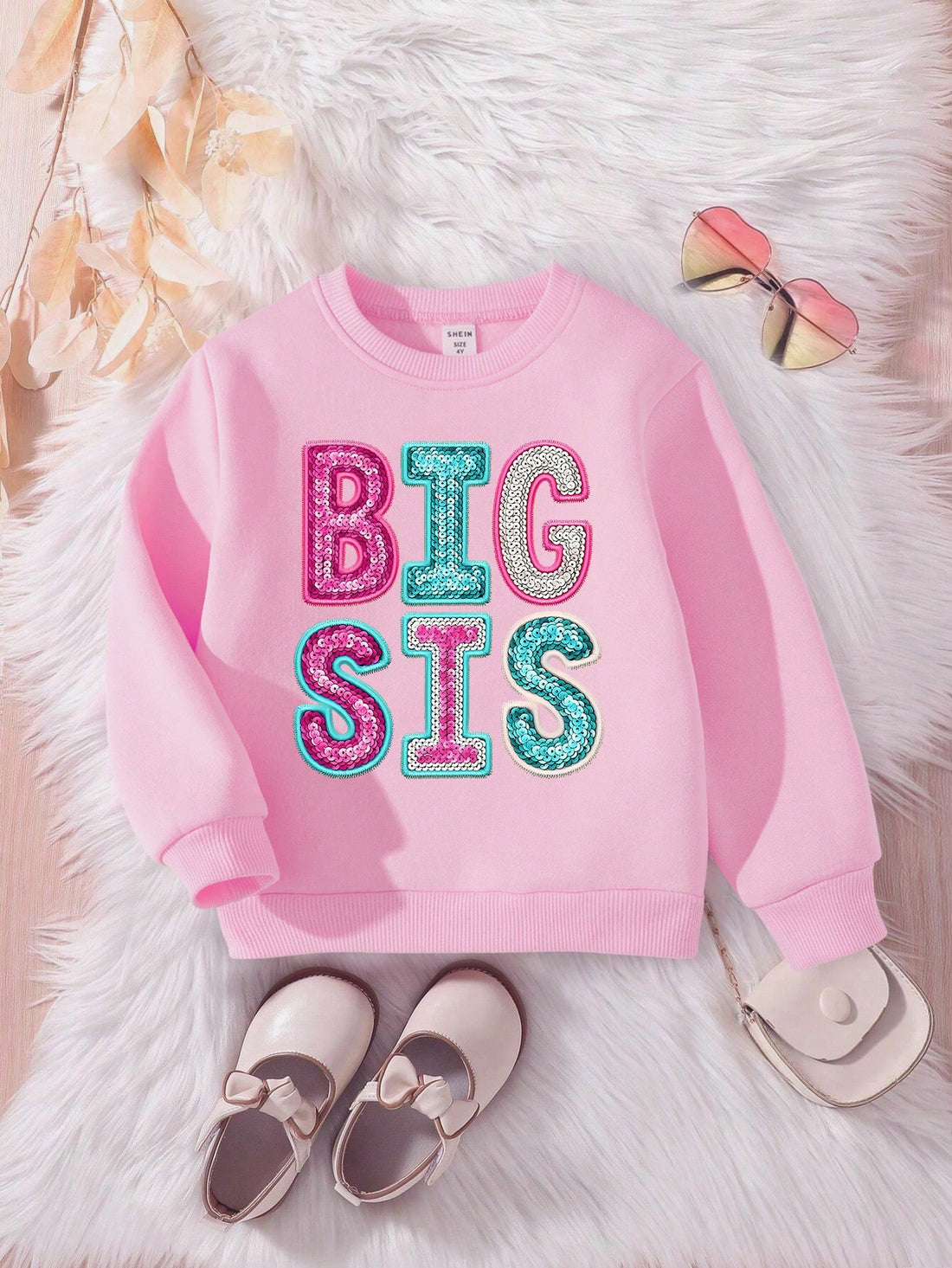 Stay stylish and comfortable with this Colorful Letter Slogan Print Sweatshirt for Stylish Young Girls. Made with a soft and cozy material, this sweatshirt features a colorful letter print that will make a statement. Perfect for any stylish young girl, add this sweatshirt to your wardrobe for a cool and trendy look.