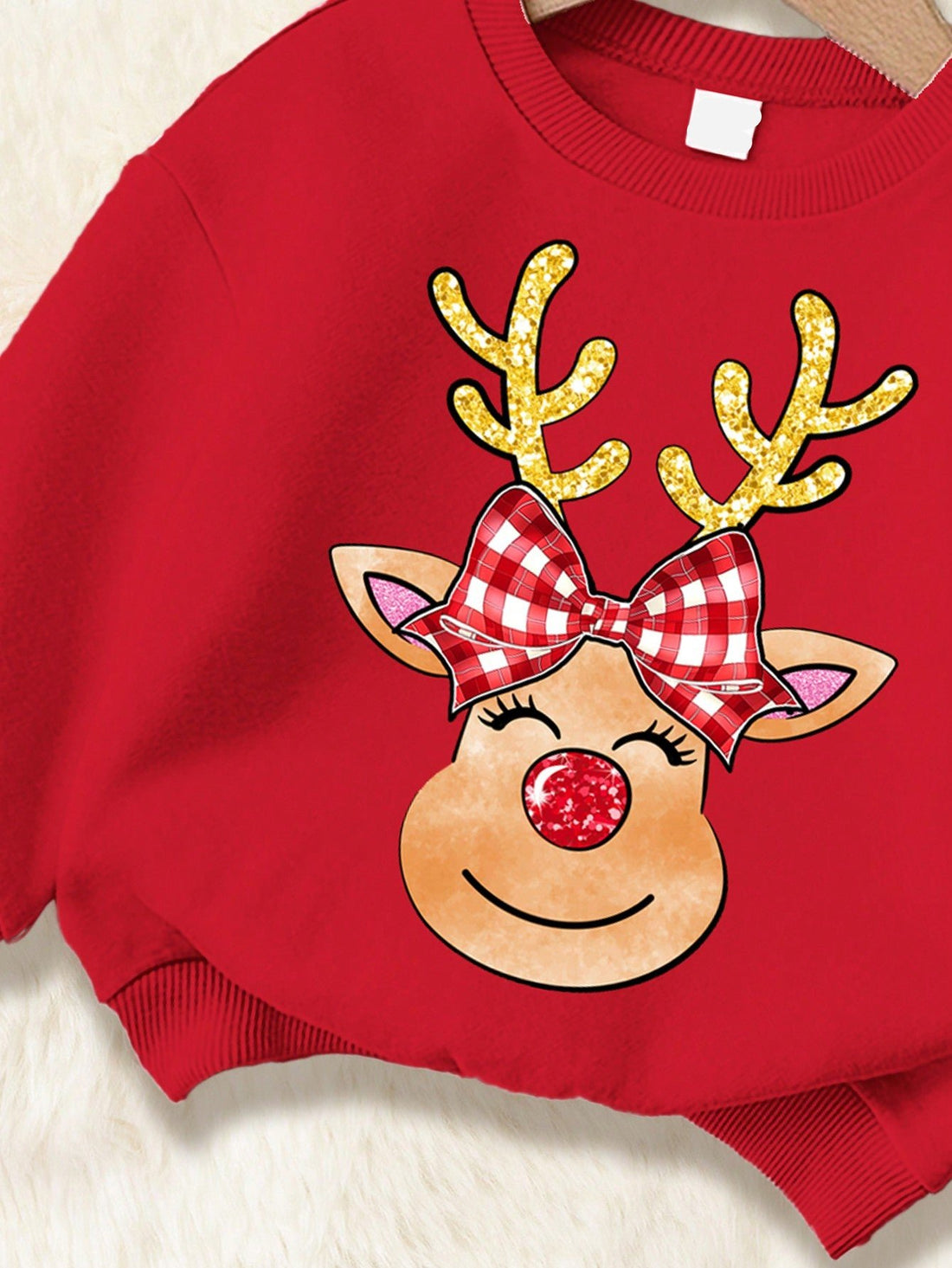 Introduce your little one to the holiday season with our Adorable Christmas Deer Knit Sweatshirt for Baby Girls. Made from soft and cozy knit material, this pullover will keep your baby warm and comfortable during autumn and winter. Featuring an adorable deer design, it's perfect for festive family gatherings and holiday photos.