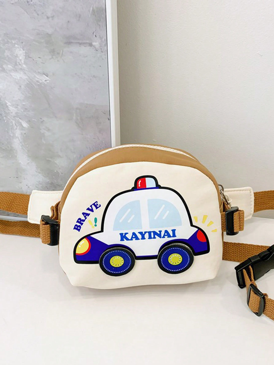 Introduce your child to the world of fashion and functionality with our Trendy Japanese-Inspired Cartoon Car Underarm Bag for Kids. Made from durable materials, this versatile small square crossbody bag features a convenient zipper closure to keep their belongings safe. Perfect for everyday use, it also adds a touch of playfulness to any outfit.