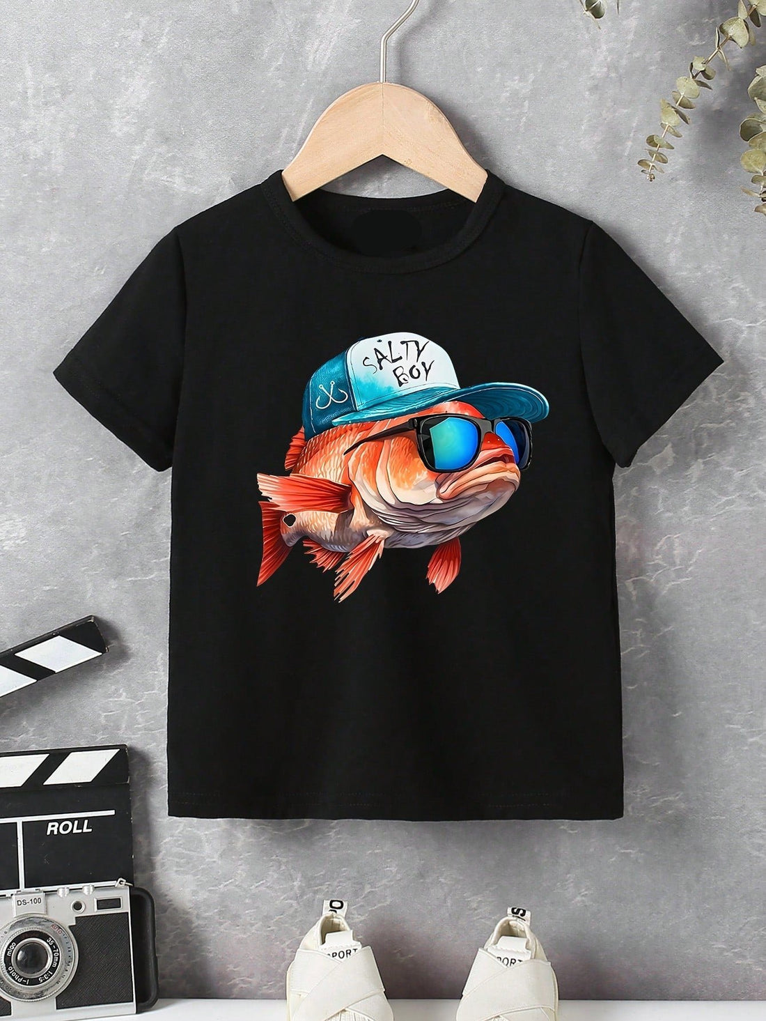 Unleash your little adventurer's wild side with our Adorable Cartoon Fish Pattern T-Shirt! Featuring a playful fish design and a comfortable round neck, this tee is perfect for young boys who love to take risks. So go ahead, add some excitement to their wardrobe with this casual and fun t-shirt!