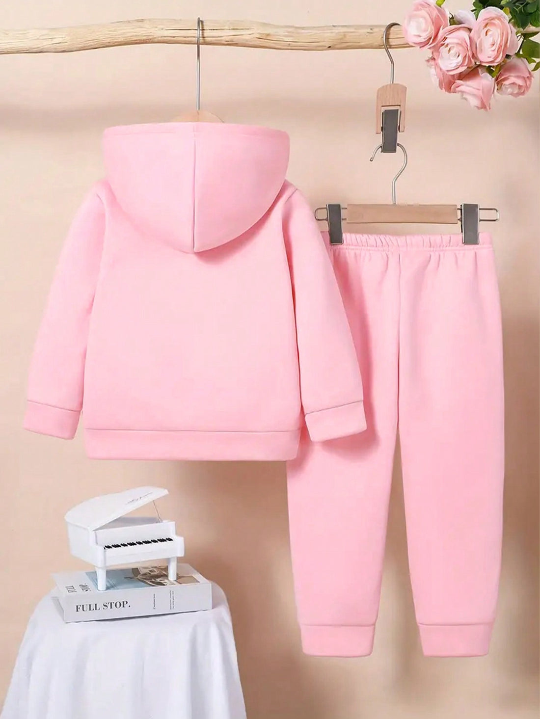 This cozy 2-piece outfit features an adorable 'Daddy's Girl' cartoon hoodie and pants set for your toddler girl. Made for comfort and style, your little one will stay warm and cute all day long. Show off your daddy's girl with this delightful ensemble. Available now.